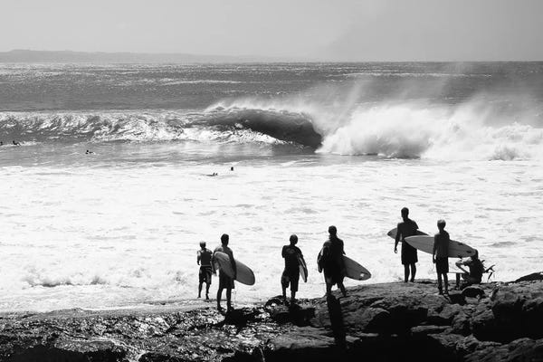 Rocky Beaches: Silhouette Of Surfers Standing On The Beach, Australia by Panoramic Images