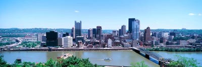Buildings at the waterfront, Monongahela River, Pittsburgh, Pennsylvania, USA by Panoramic Images framed canvas print