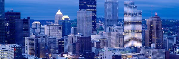 Pennsylvania: Buildings in a city lit up at dusk, Pittsburgh, Pennsylvania, USA by Panoramic Images