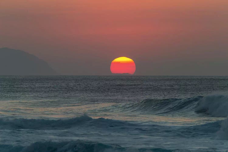 Waves In The Ocean At Sunset