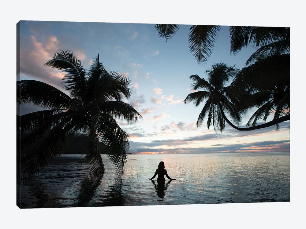 Woman Standing In The Pacific Ocean At Sunset, Moorea, Tahiti, French Polynesia III by Panoramic Images 1-piece Canvas Art Print