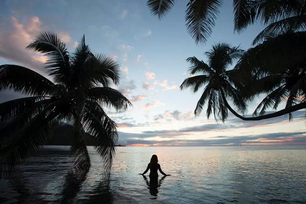 French Polynesia: Woman Standing In The Pacific Ocean At Sunset, Moorea, Tahiti, French Polynesia III by Panoramic Images