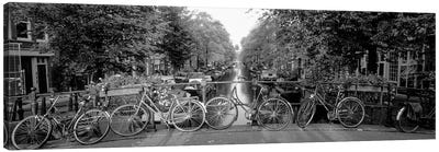 Bicycles On Bridge Over Canal, Amsterdam, Netherlands Canvas Art Print - Bicycle Art