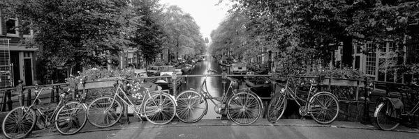 Bicycles: Bicycles On Bridge Over Canal, Amsterdam, Netherlands by Panoramic Images