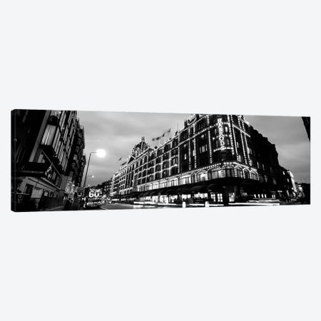 Low-Angle View Of Buildings Lit Up At Night, Harrods, London, England Canvas Print #PIM15178} by Panoramic Images Canvas Art