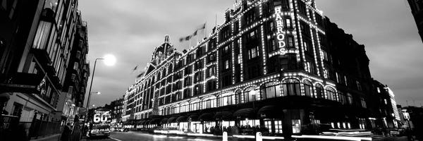 Low-Angle View Of Buildings Lit Up At Night, Harrods, London, England