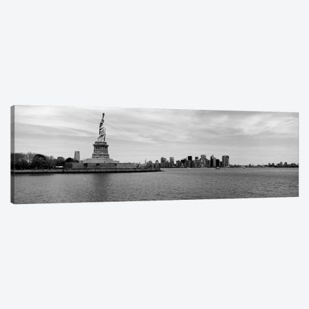 Statue Of Liberty With Manhattan Skyline In The Background, Ellis Island, New York City, New York State, USA Canvas Print #PIM15237} by Panoramic Images Canvas Art