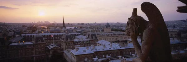Notre Dame Cathedral: Chimera Sculpture With A Cityscape In The Background, Galerie Des Chimeres, Notre Dame, Paris, Ile-De-France, France by Panoramic Images