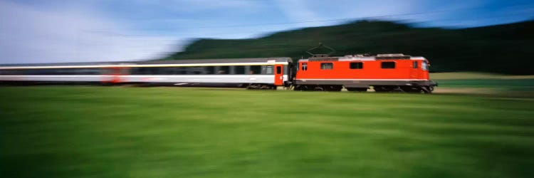 Train moving on a railroad track by Panoramic Images wall art