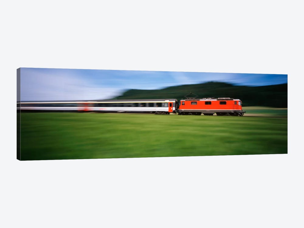 Train moving on a railroad track by Panoramic Images 1-piece Canvas Wall Art