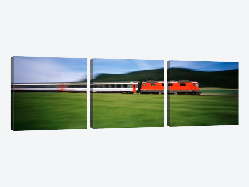 Train moving on a railroad track by Panoramic Images 3-piece Canvas Art