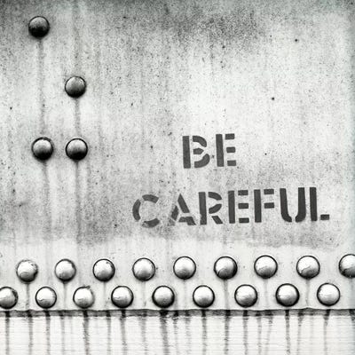 Canvas Print: Be careful text written on metal door by Panoramic Images - thumbnail