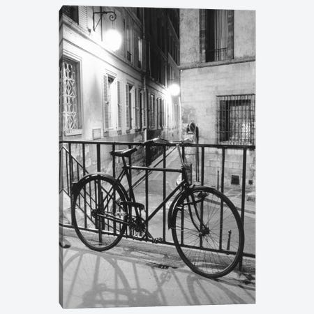 Bicycle against railing, Paris, France Canvas Print #PIM15381} by Panoramic Images Art Print