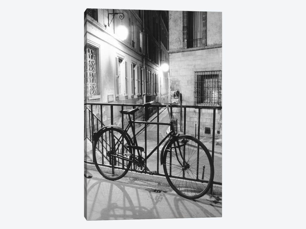 Bicycle against railing, Paris, France by Panoramic Images 1-piece Art Print