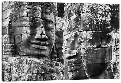 Carved stone faces in the Khmer temple of Bayon, Siem Reap, Cambodia Canvas Art Print - Cambodia Art