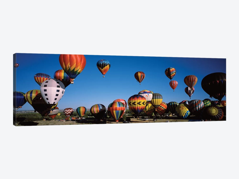 Hot air balloons floating in sky, Albuquerque International Balloon Fiesta, Albuquerque, Bernalillo County, New Mexico, USA by Panoramic Images 1-piece Canvas Art