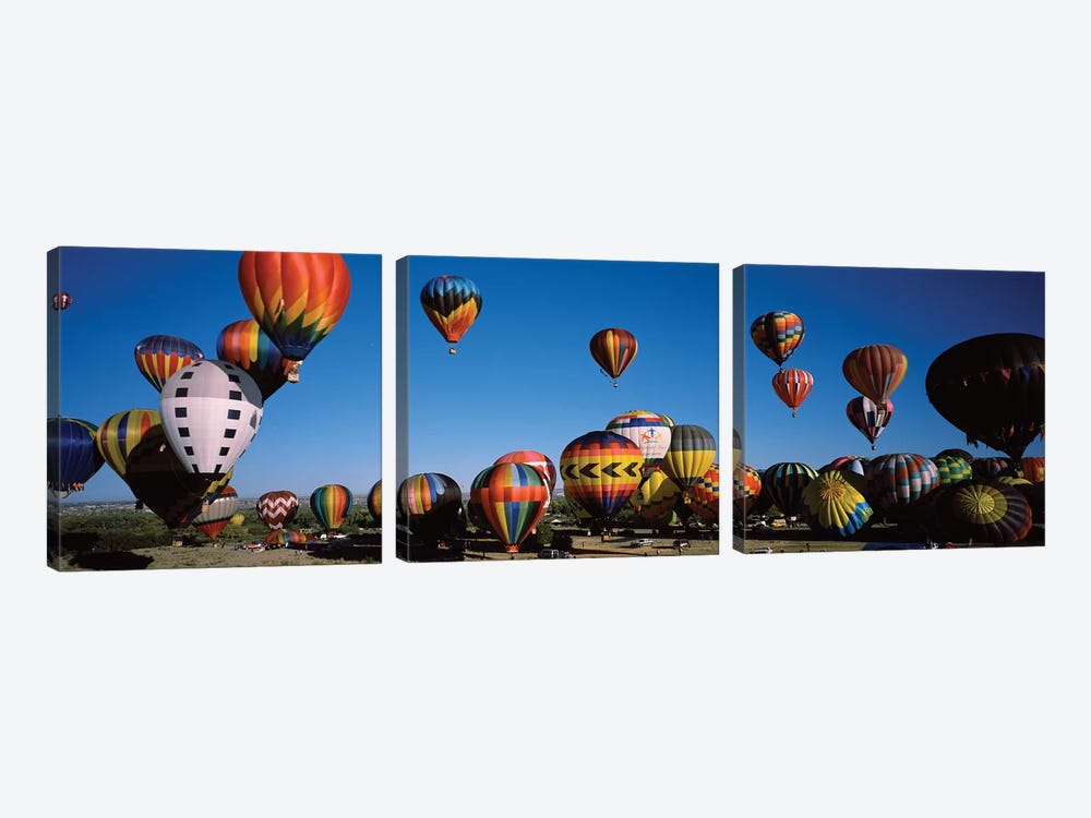 Hot air balloons floating in sky, Albuquerque International Balloon Fiesta, Albuquerque, Bernalillo County, New Mexico, USA by Panoramic Images 3-piece Canvas Artwork