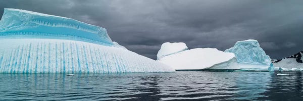 Antarctica: Icebergs floating in the Southern Ocean III, Iceberg Graveyard, Lemaire Channel, Antarctic Peninsula, Antarctica by Panoramic Images