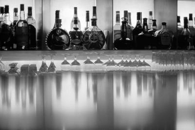 Liquor bottles and glasses, Paris, France by Panoramic Images canvas print
