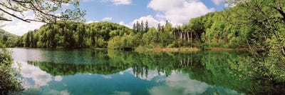 Reflection of trees and clouds on water, Plitvice Lakes National Park, Lika-Senj County, Karlovac County, Croatia by Panoramic Images framed canvas print