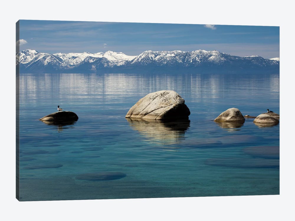 Rocks in a lake with mountain range in the background, Lake Tahoe, California, USA by Panoramic Images 1-piece Art Print