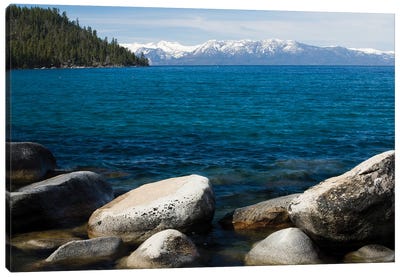 Rocks in a lake with mountain range in the background, Lake Tahoe, California, USA Canvas Art Print