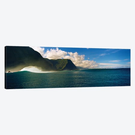 Rolling waves with mountains in the background, Molokai, Hawaii Canvas Print #PIM15706} by Panoramic Images Canvas Artwork
