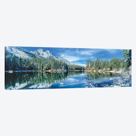 Snow covered mountain and trees reflected in lake, Grand Tetons, Wyoming, USA Canvas Print #PIM15750} by Panoramic Images Canvas Wall Art