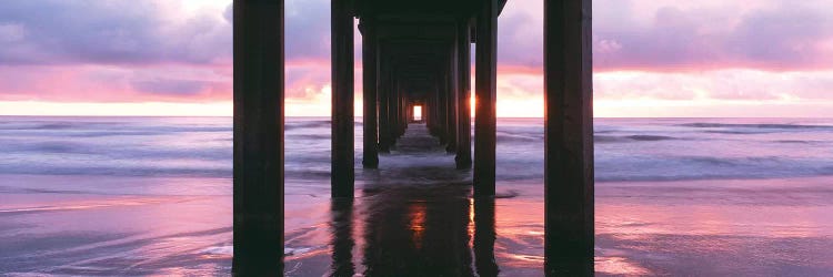 Sunrise over the Pacific Ocean seen from under Scripps Pier, La Jolla Shores Beach, La Jolla, San Diego County, California, USA