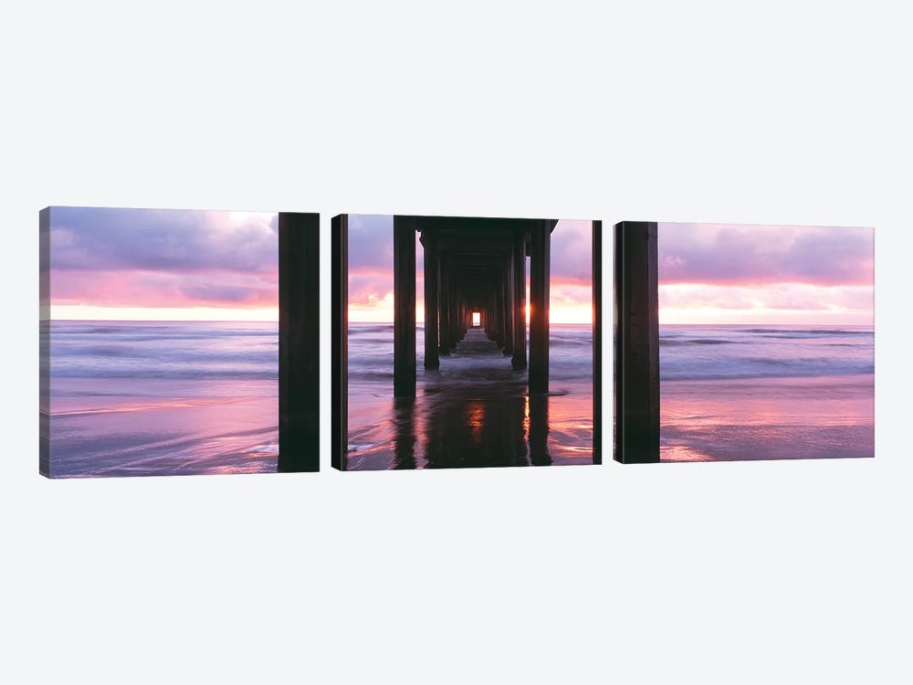 Sunrise over the Pacific Ocean seen from under Scripps Pier, La Jolla Shores Beach, La Jolla, San Diego County, California, USA by Panoramic Images 3-piece Canvas Wall Art