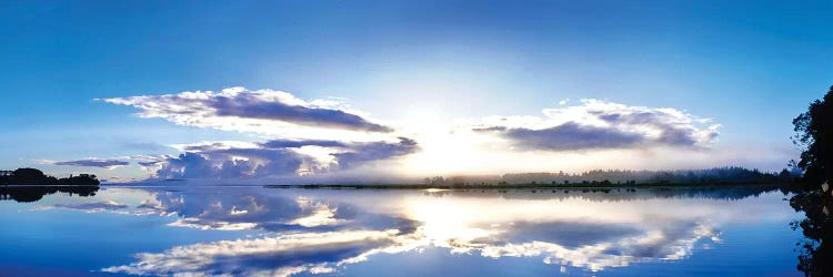 Sunrise reflected on water, Mangawhai, Northland, New Zealand