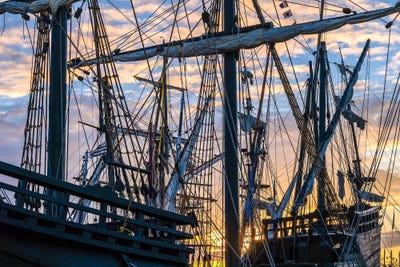 Tall ships against sky at sunrise, Rosmeur Harbour in Douarnenez city, Finistere, Brittany, France by Panoramic Images canvas print