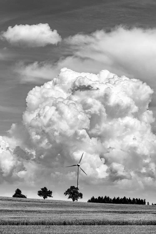 Wind turbine with cumulus cloud, Baden Wurttemberg, Germany