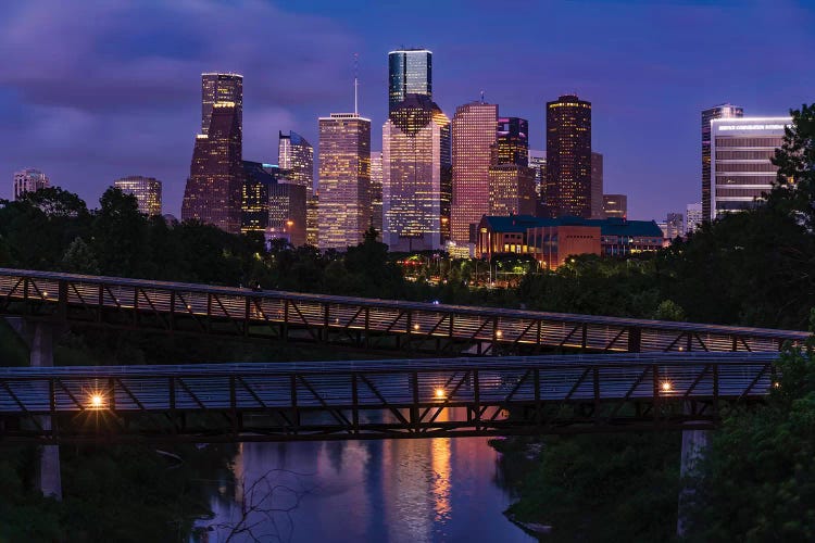 Elevated Walkway Over Buffalo Bayou At Night With Downtown Skyline In Background, Houston, Texas, USA