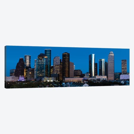 High Rise Buildings In Houston Cityscape Illuminated At Sunset, Houston, Texas Canvas Print #PIM15894} by Panoramic Images Canvas Artwork