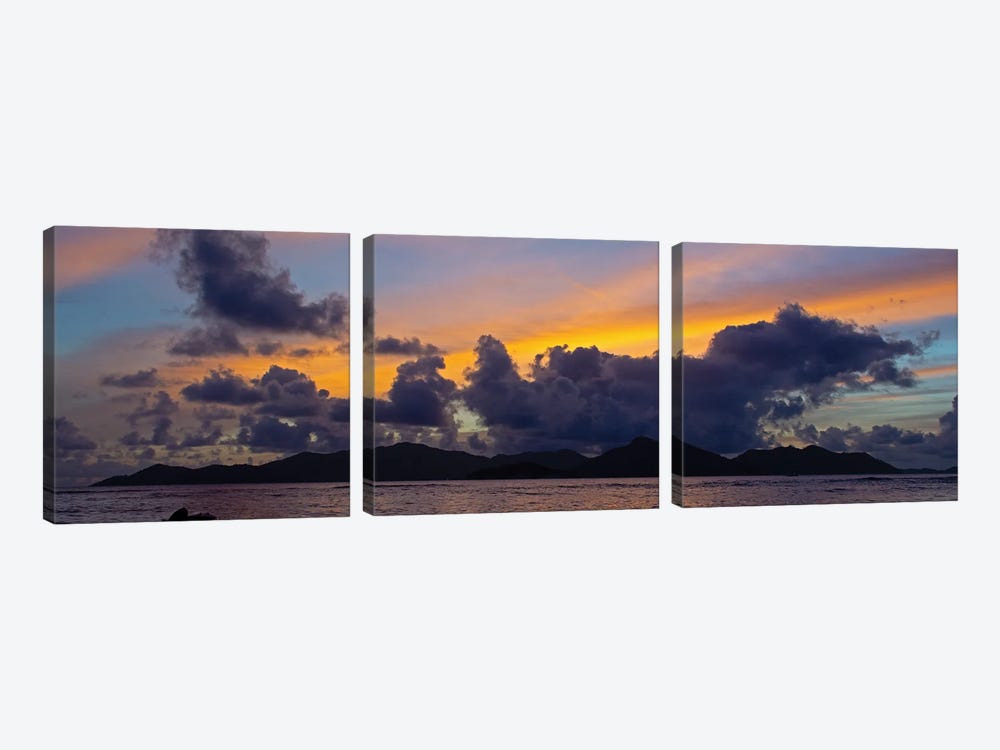 Silhouetted Fishing Boat In Sea At Sunset With Praslin Island In Background, La Digue, Seychelles by Panoramic Images 3-piece Canvas Art Print