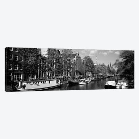 Boats In A Channel, Amsterdam, Netherlands Canvas Print #PIM16120} by Panoramic Images Canvas Print