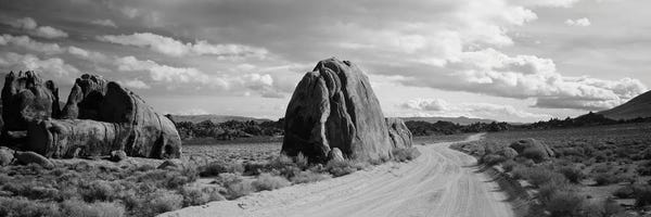 Dirt Road Passing Through A Desert, Owens Valley, Sierras, California, USA