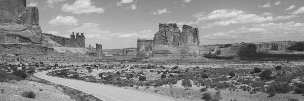 Arches National Park: Empty Road Running Through A National Park, Arches National Park, Utah, USA by Panoramic Images