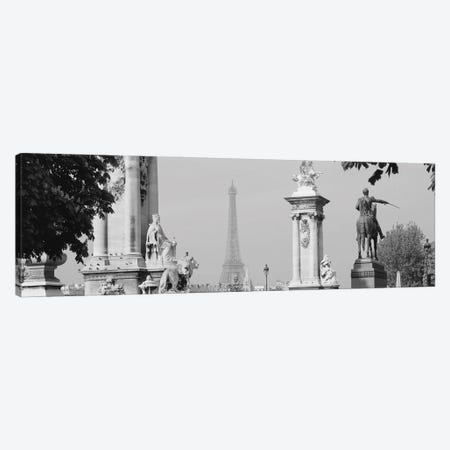 Low Angle View Of A Statue, Alexandre III Bridge, Eiffel Tower, Paris, France Canvas Print #PIM16195} by Panoramic Images Canvas Print