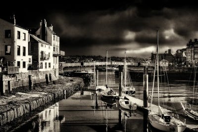 The Harbour And River Esk On A Stormy Evening, Whitby, Yorkshire, England by Panoramic Images framed wall art