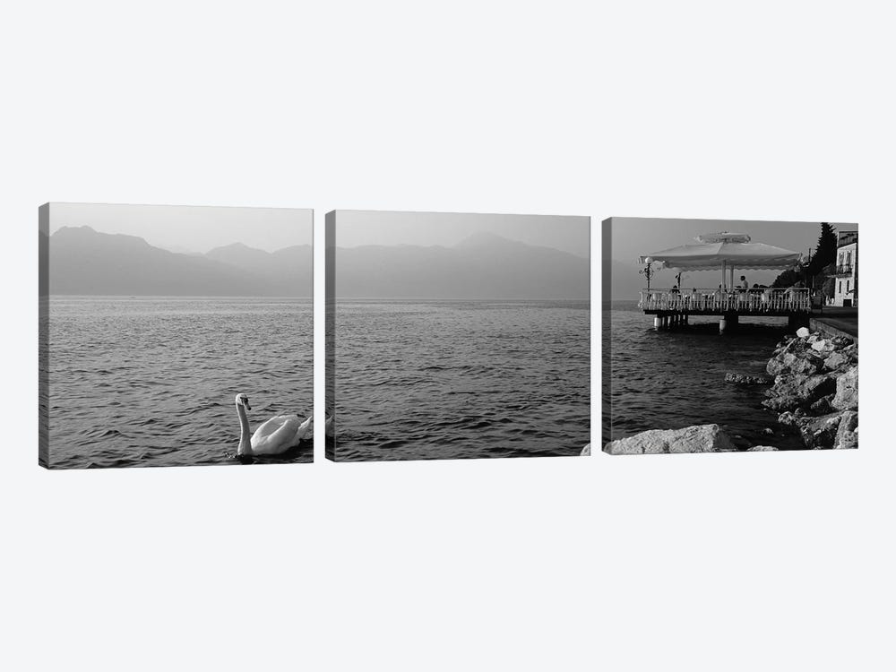 Tourist On A Porch, Lake Garda, Torri Del Benaco, Italy by Panoramic Images 3-piece Canvas Wall Art