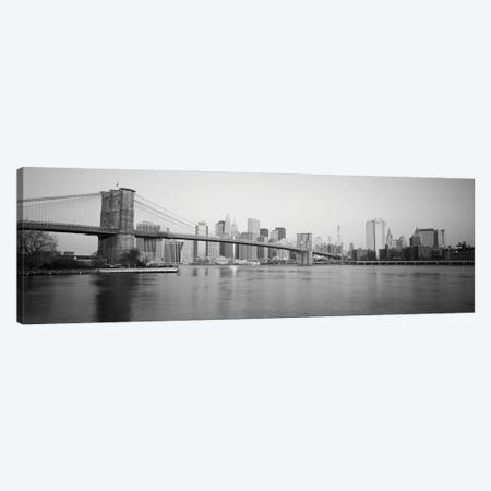 USA, New York State, New York City, Brooklyn Bridge, Skyscrapers in a city Canvas Print #PIM16261} by Panoramic Images Canvas Artwork