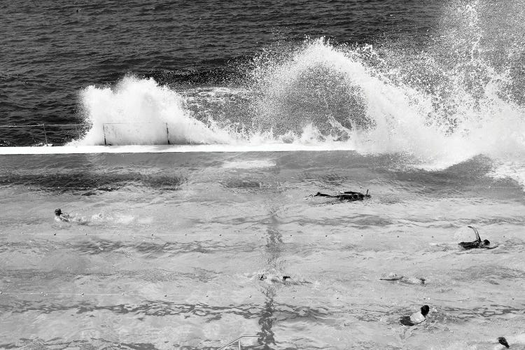 Waves Breaking Over Edge Of Pool Of Bondi Icebergs Swim Club, Bondi Beach, Sydney, New South Wales, Australia