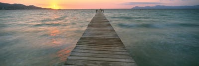 Pier At Sunset In The Sea, Alcudia, Majorca, Spain by Panoramic Images framed canvas print