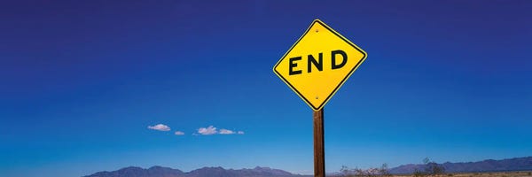 Signs: The End Against A Blue Sky by Panoramic Images
