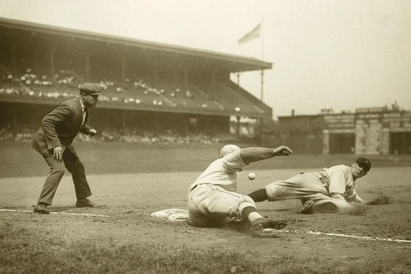 Athletes & Coaches: Sliding Safe Into Third Base Cleveland Indians Vs Athletics At Shibe Park Philadelphia PA USA by Panoramic Images