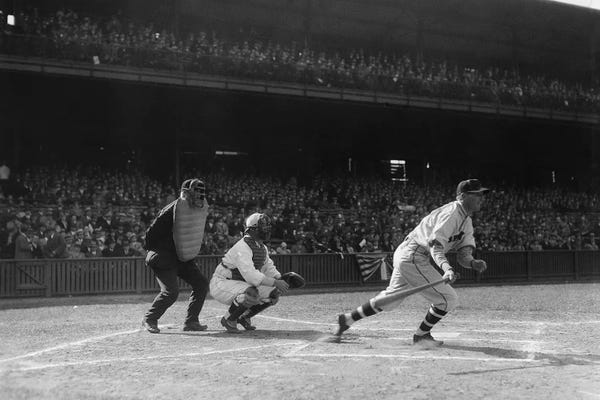 Baseball Game Batter About To Run After Making A Hit