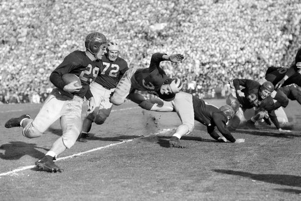 Athletes & Coaches: 1930s College Football Teams Playing, Man Carrying The Ball by Panoramic Images