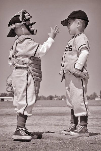 1960s Two Boys In Little League Baseball Uniforms Having A Conversation On The Pitcher's Mound